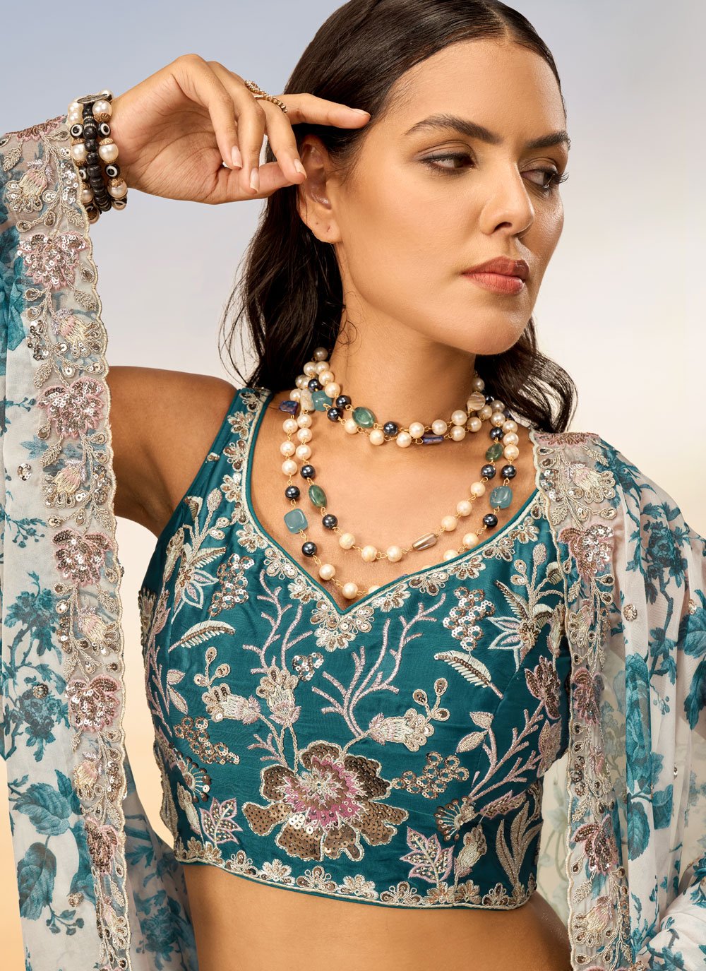 Graceful Teal Poly Chiffon Reception Wear Lehenga Choli with Net Dupatta