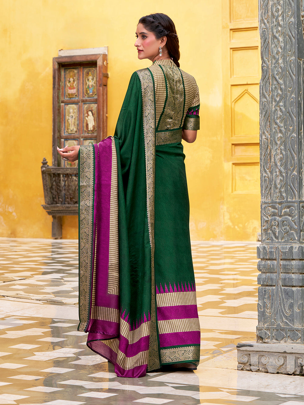 Traditional green saree with zari border