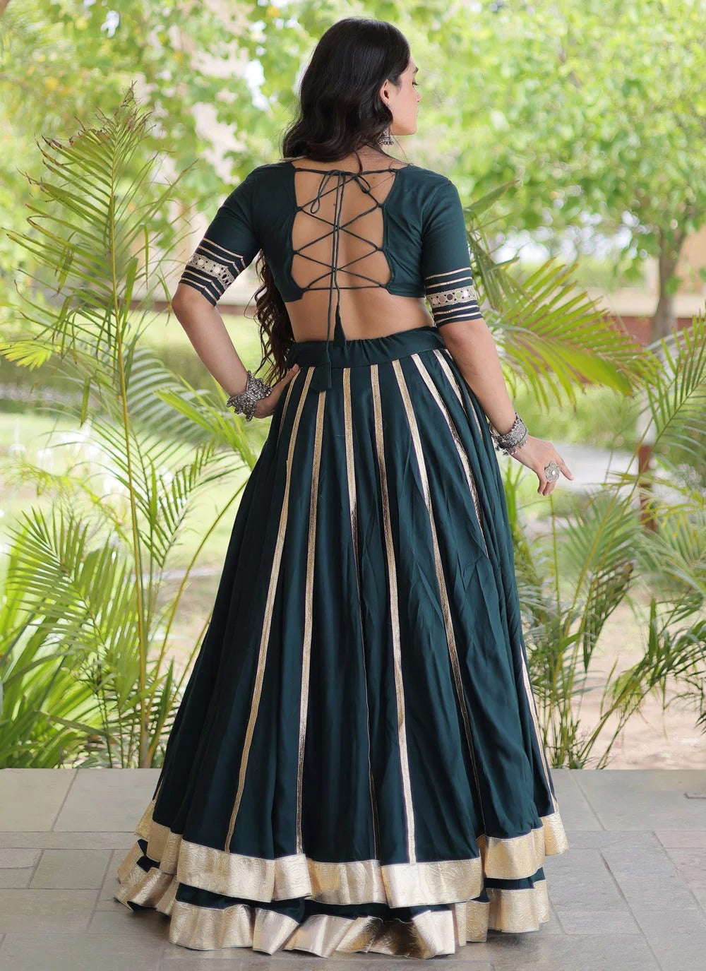 Green Reyon lehenga featuring traditional Gamthi embroidery and real mirror work
