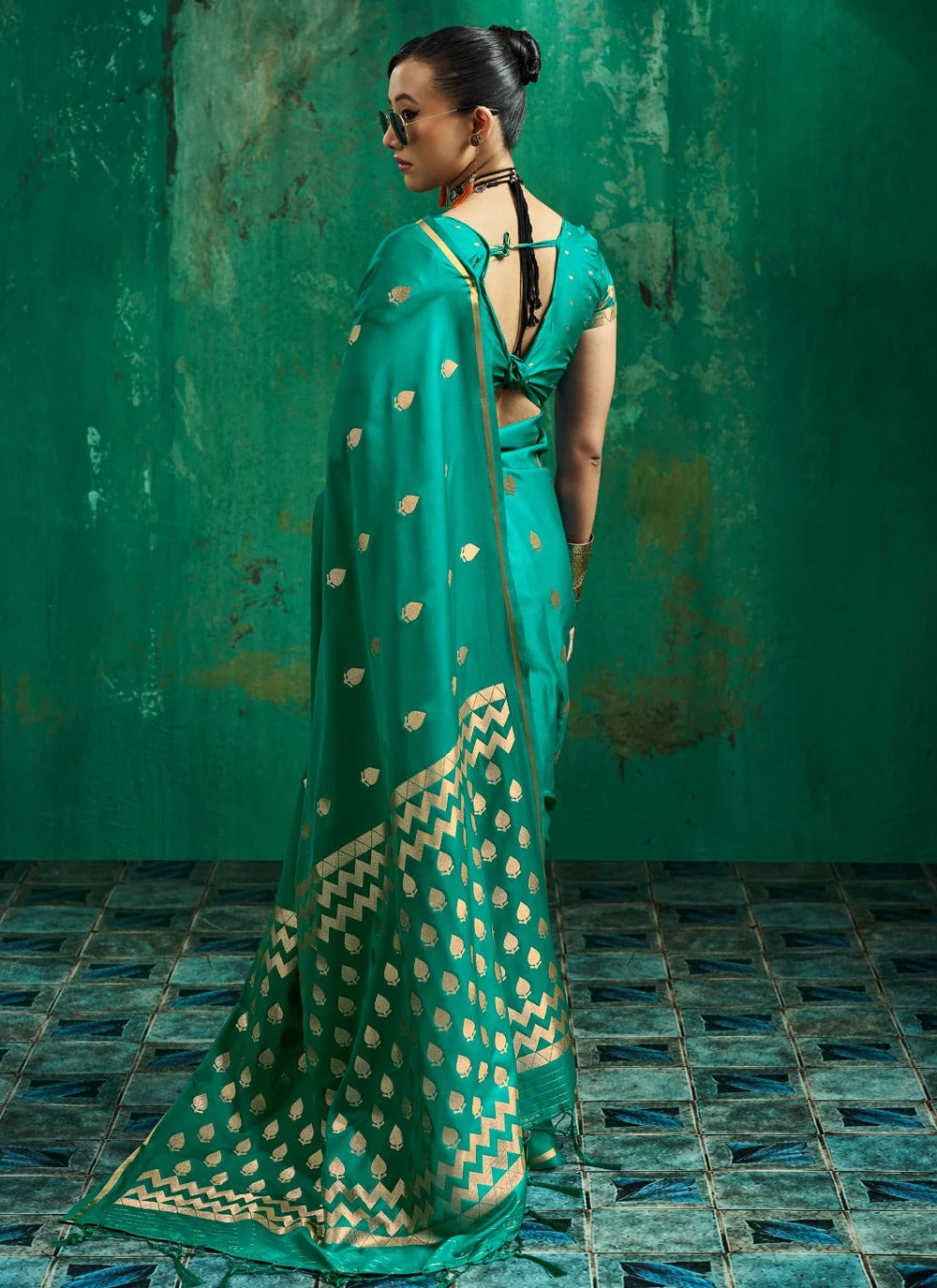 Contemporary alluring green satin saree with handloom-woven blouse