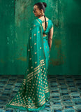 Contemporary alluring green satin saree with handloom-woven blouse