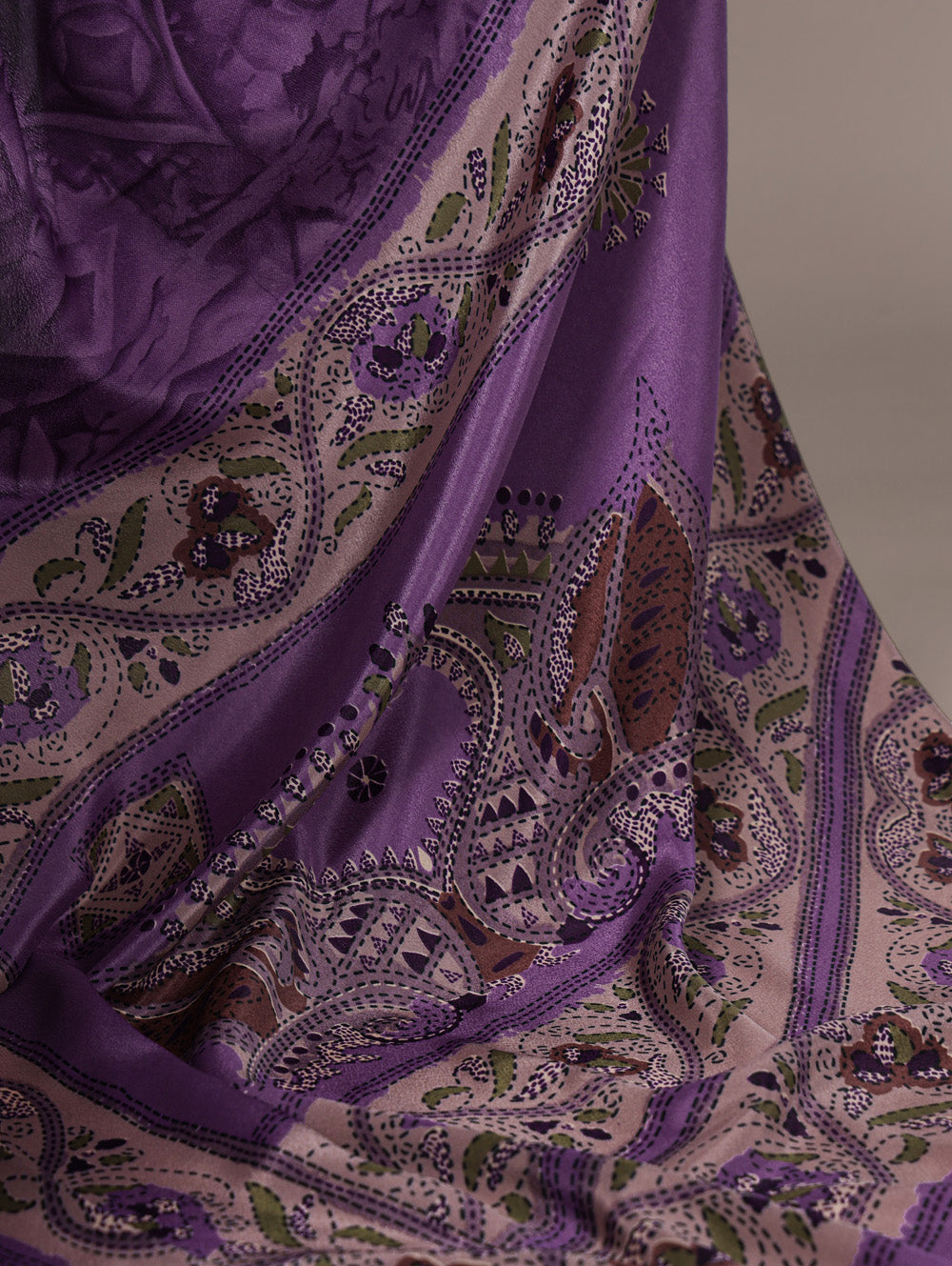 Elegant purple saree for traditional gatherings