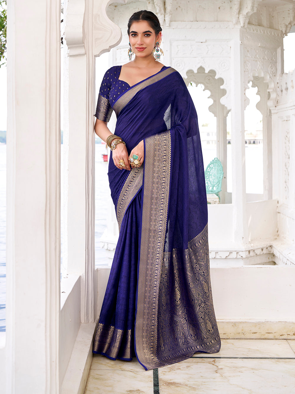 Navy blue Chinon saree with zari weaving