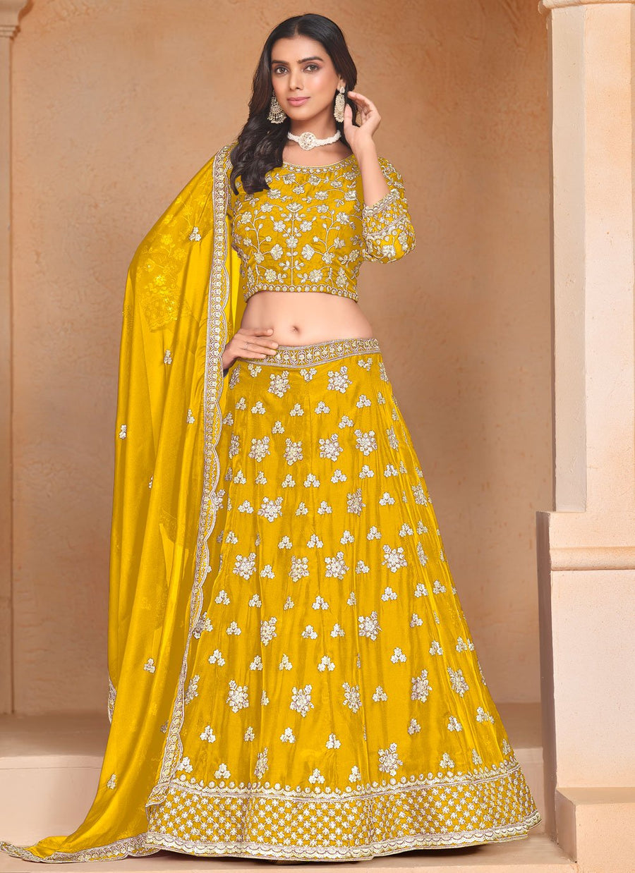 Yellow organza haldi special lehenga with embroidery work