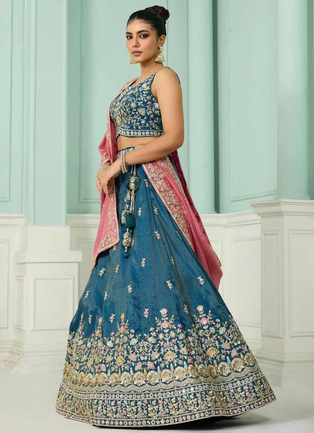 teal cosmos silk wedding lehenga with sequin, beads, and stone embroidery, paired with embroidered blouse and dupatta
