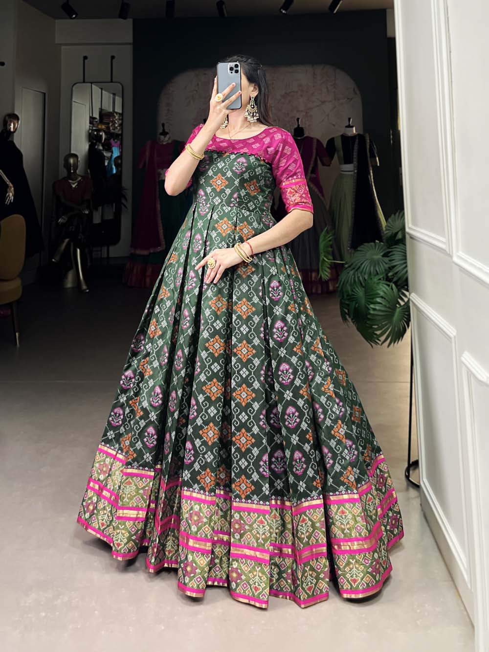 Green Color Jacquard Silk Patola Print With Zari Weaving Work Gown