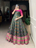 Green Color Jacquard Silk Patola Print With Zari Weaving Work Gown