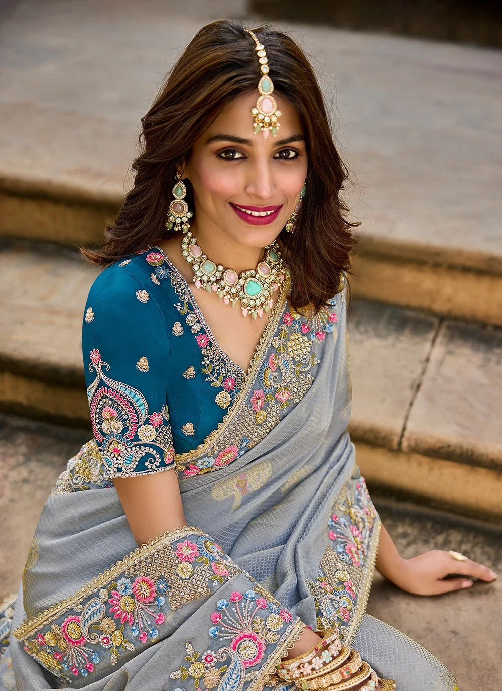 designer silk saree for wedding in smokey grey with floral embroidery