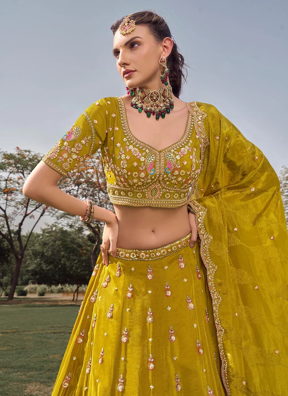 Regal Mustard Green Tissue Lehenga Choli with Heavy Bead Work