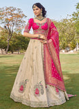 Graceful Beige Tissue Lehenga Choli with Heavy Bead Work