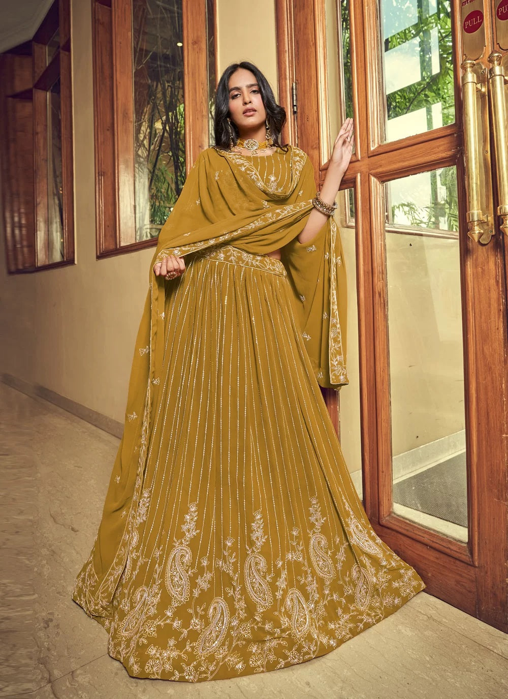 Indian Party Wear Lehenga in Yellow Faux Georgette with Exquisite Embroidery