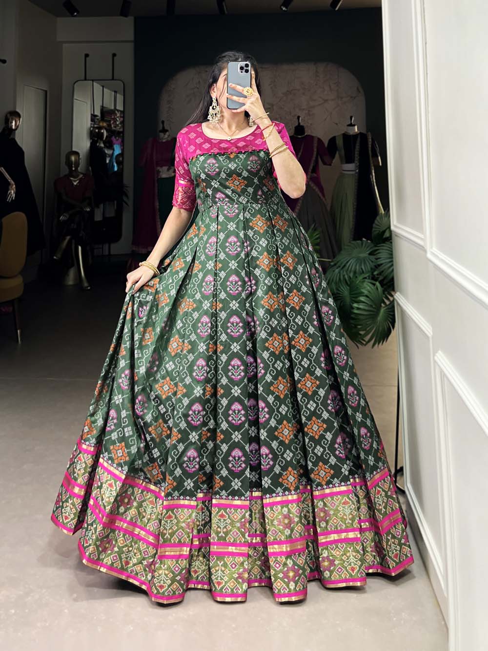 Green Color Jacquard Silk Patola Print With Zari Weaving Work Gown