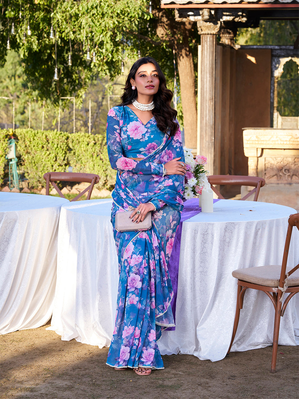 Blue saree with elegant pearl lace detailing