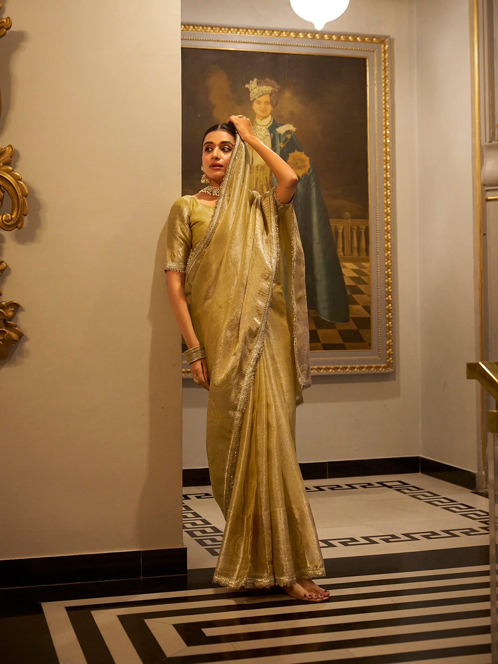 Tissue shimmer saree with sky blue blouse