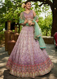 Lavender Embroidered Silk Lehenga Choli with Mirror Work & Mint Green Dupatta – Wedding Wear