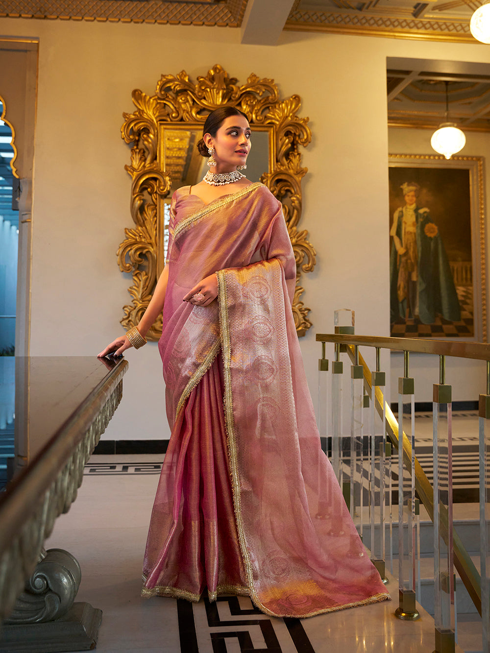 Light pink tissue shimmer saree with zari weaving