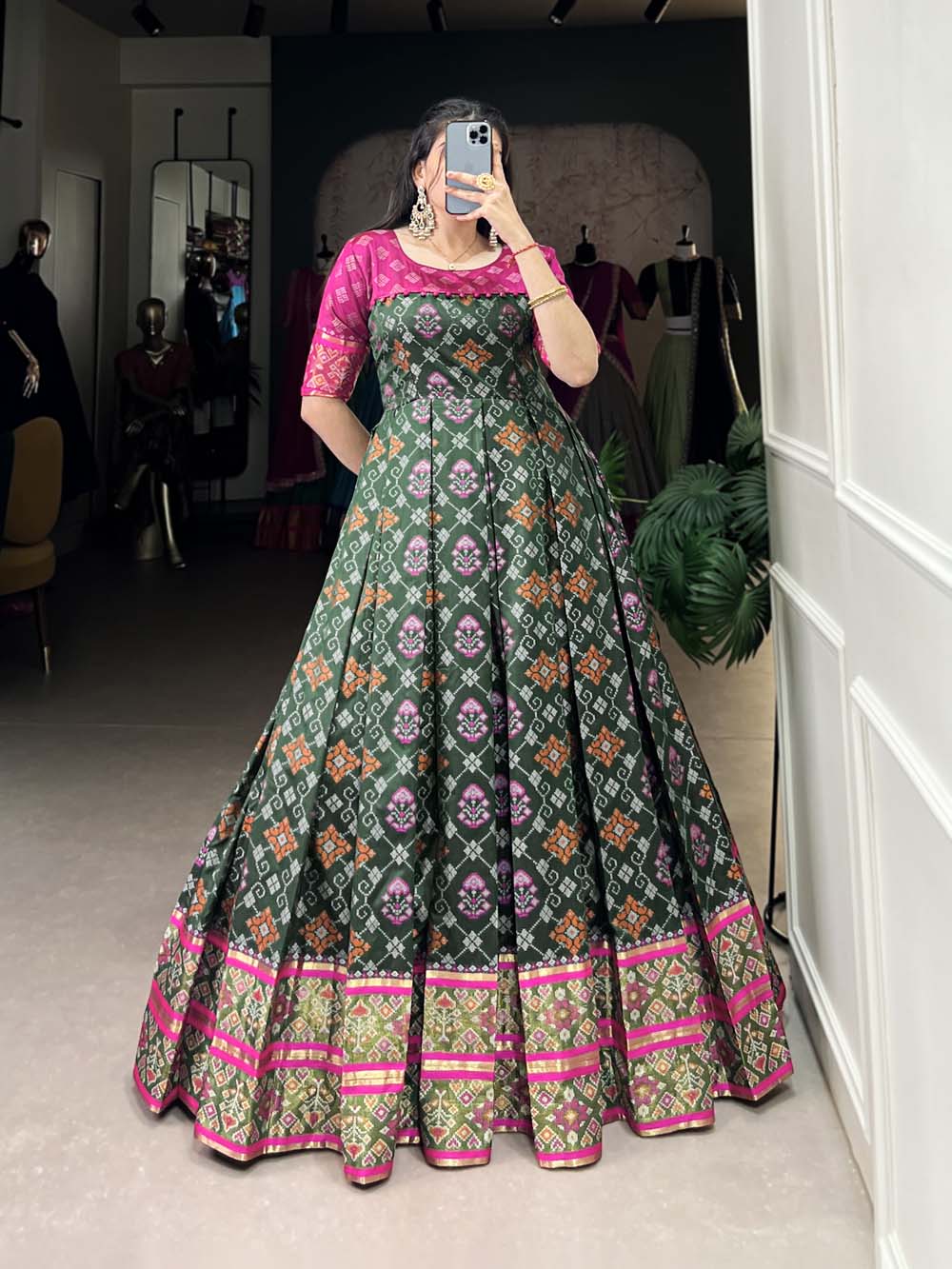 Green Color Jacquard Silk Patola Print With Zari Weaving Work Gown