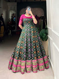 Green Color Jacquard Silk Patola Print With Zari Weaving Work Gown