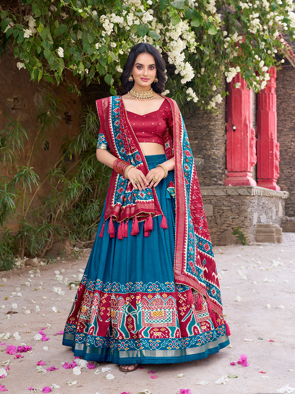 Teal Tasar silk lehenga with Patola print and foil work