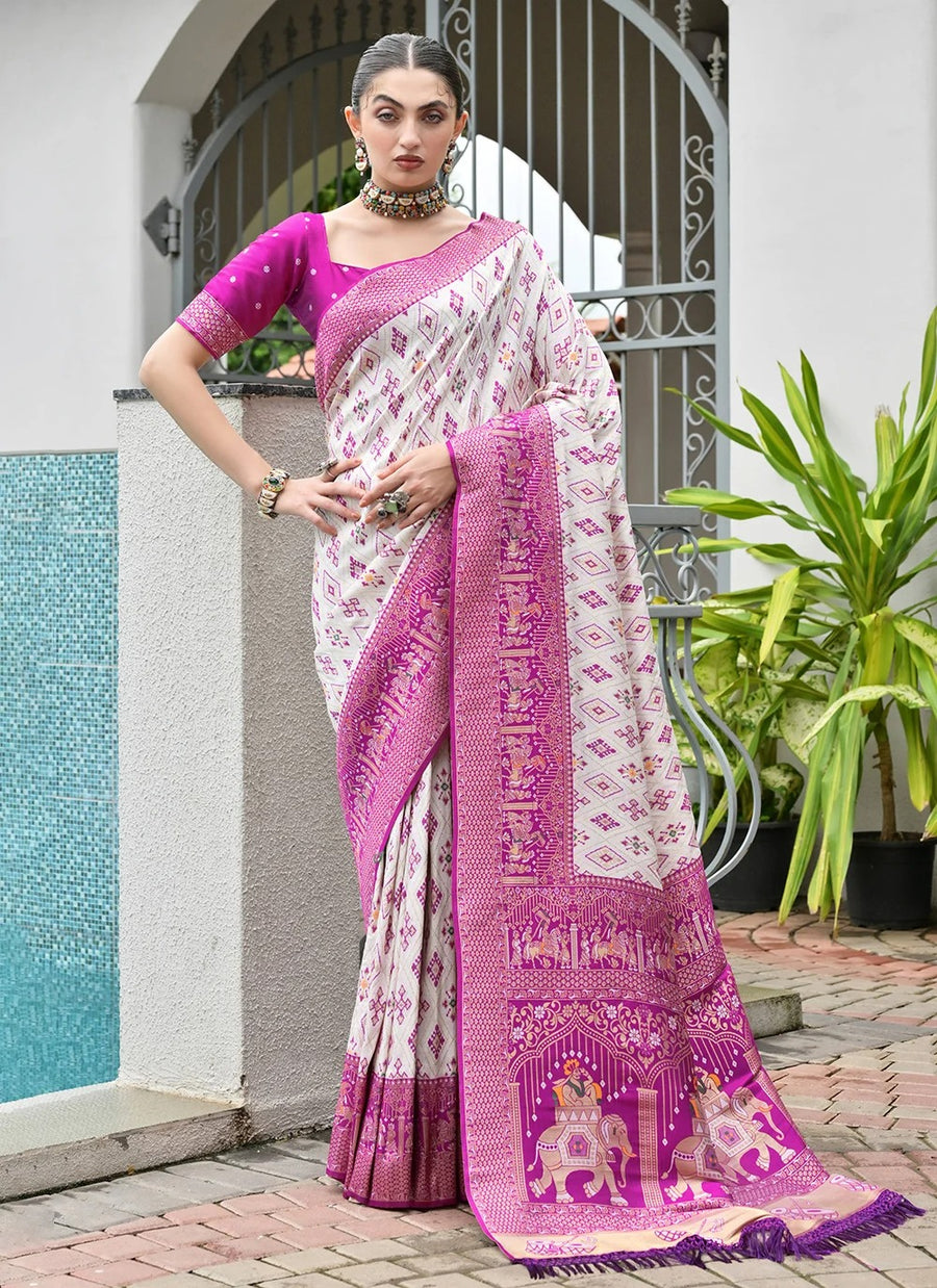 Magenta Banarasi silk Patola saree with Ajrakh zari weaving