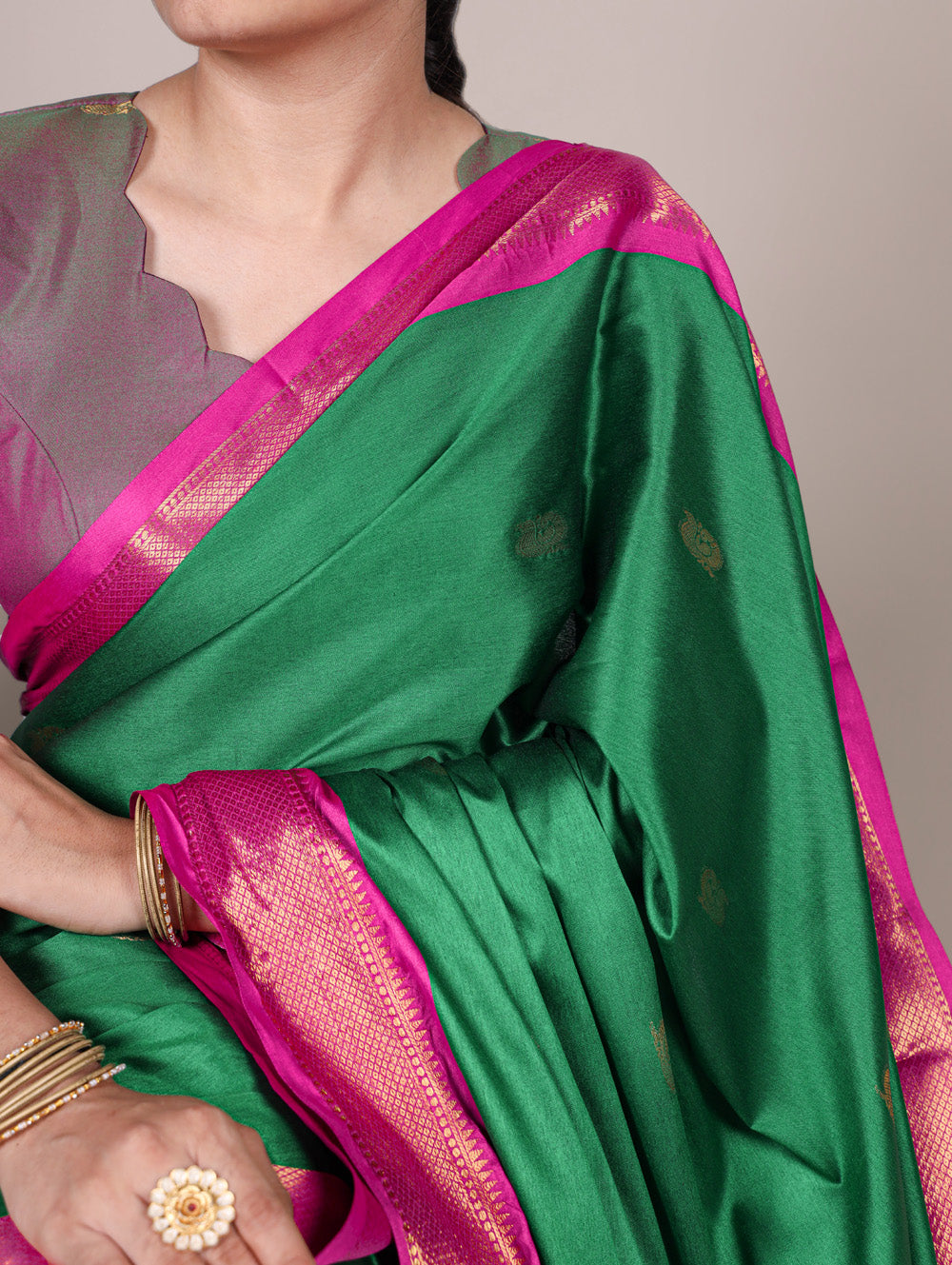 Green saree with woven border design