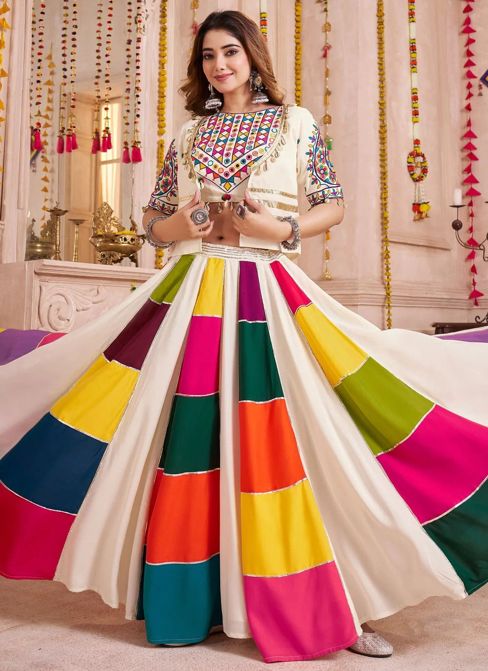 White kutchi patch work choli with embroidery and kodi border