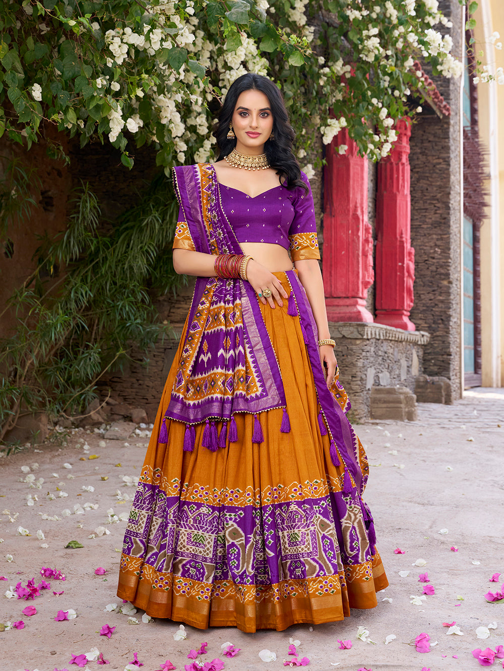 Mustard Tasar silk lehenga with Patola print and foil work