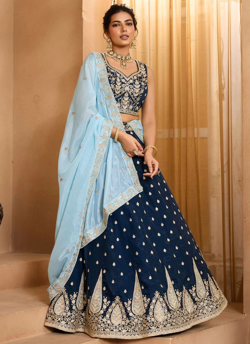 Navy blue embroidered wedding lehenga choli in organza with heavy work