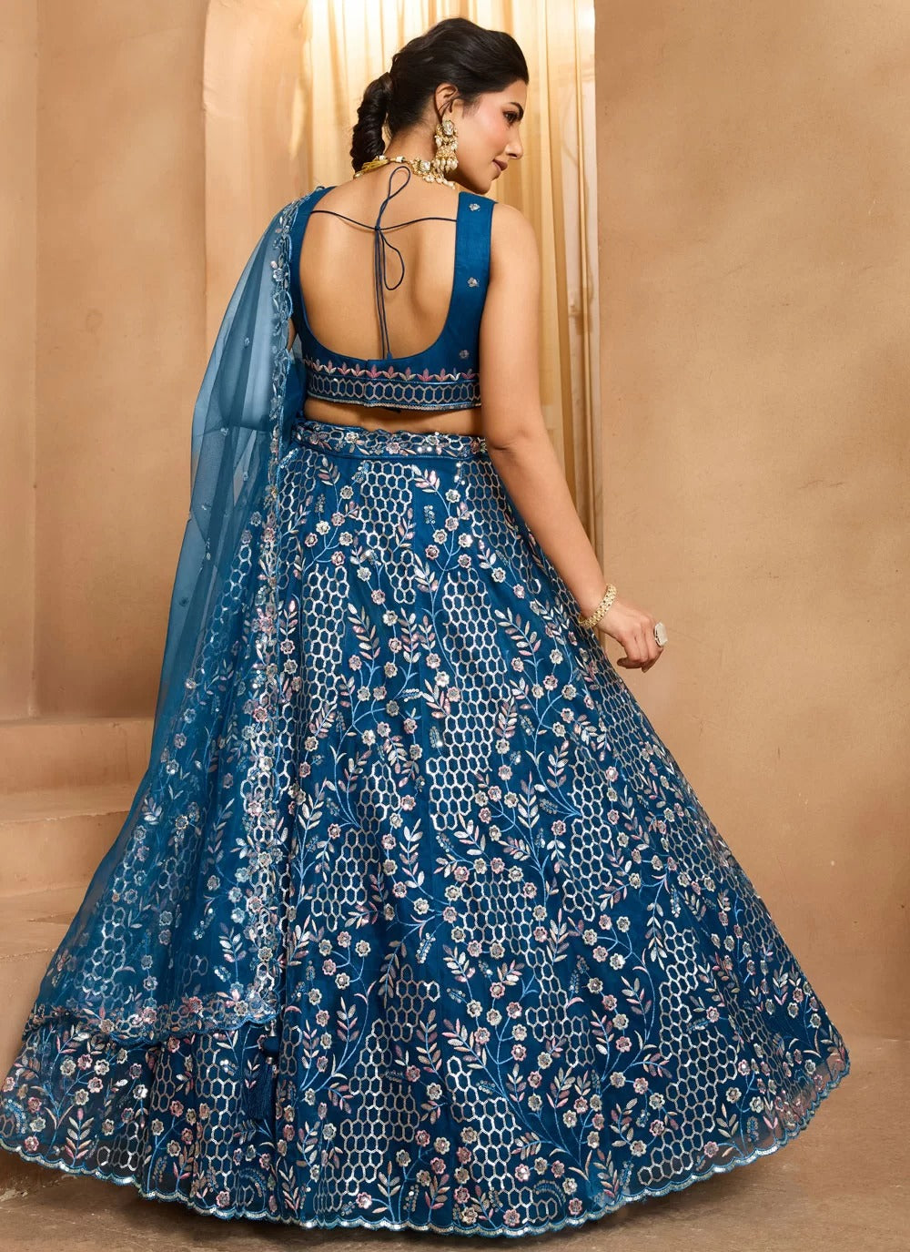 Flowy navy blue net lehenga with elegant full silhouette