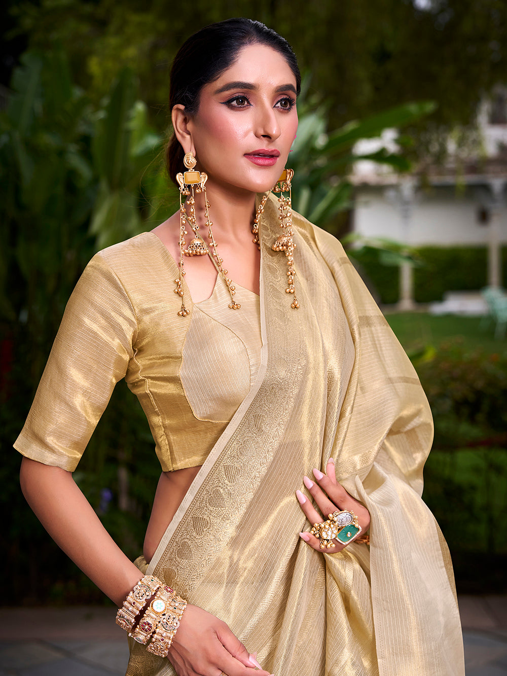 Gold tissue saree with matching blouse