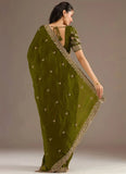 Olive green reception saree with diamond and pearl work