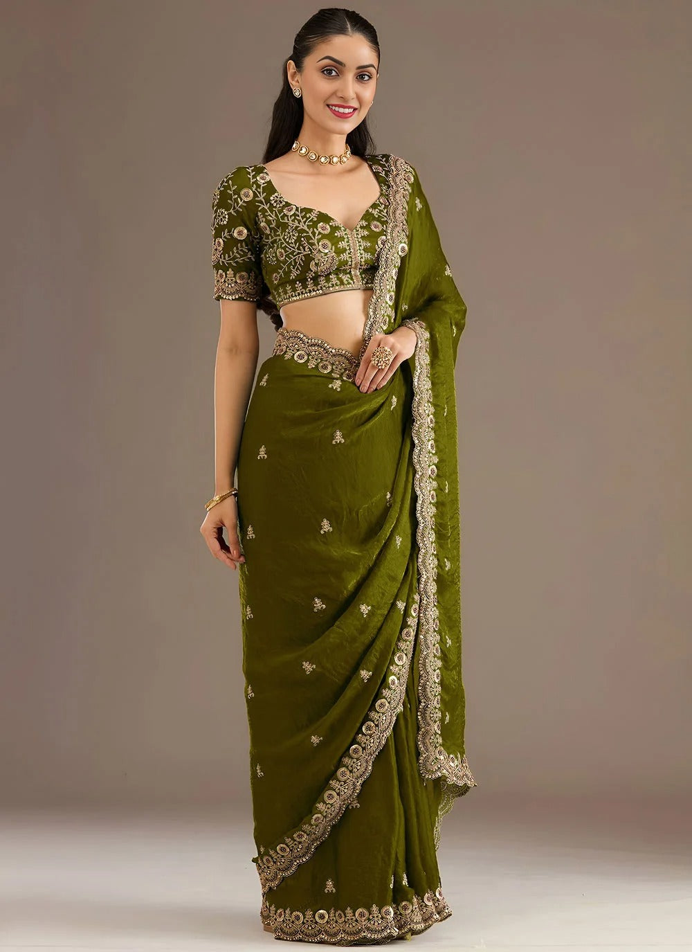 Elegant olive green festive saree with sequins work