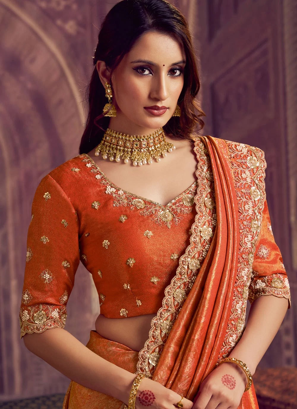 Orange Pure Zari Kanjivaram Wedding Saree with Pearl and Dual Sequence Embroidery