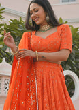 Orange wedding function lehenga with organza dupatta