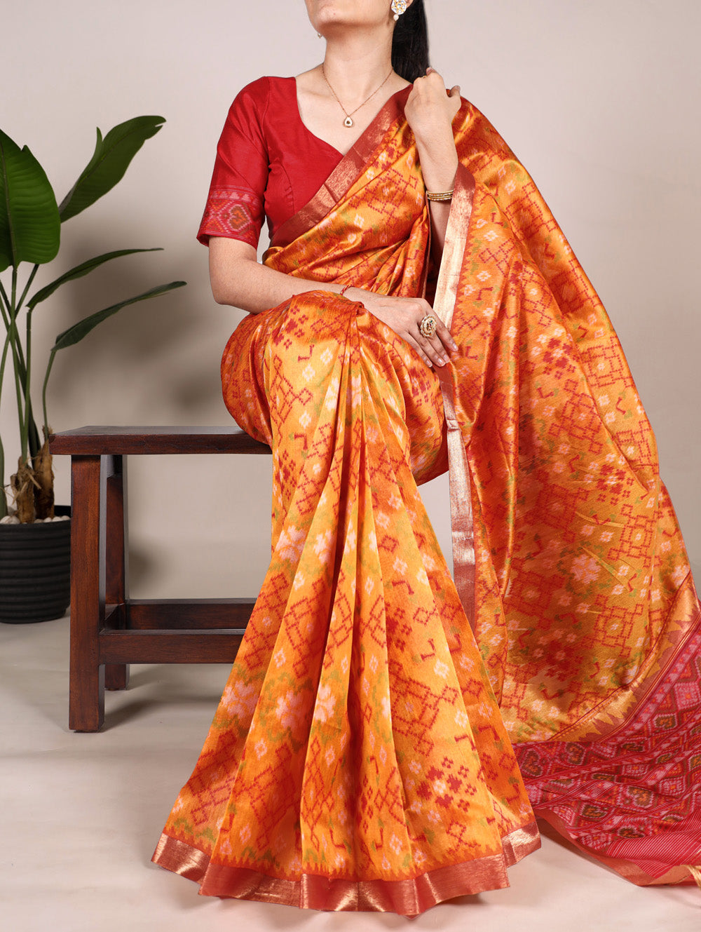 Orange patola print jacquard silk saree