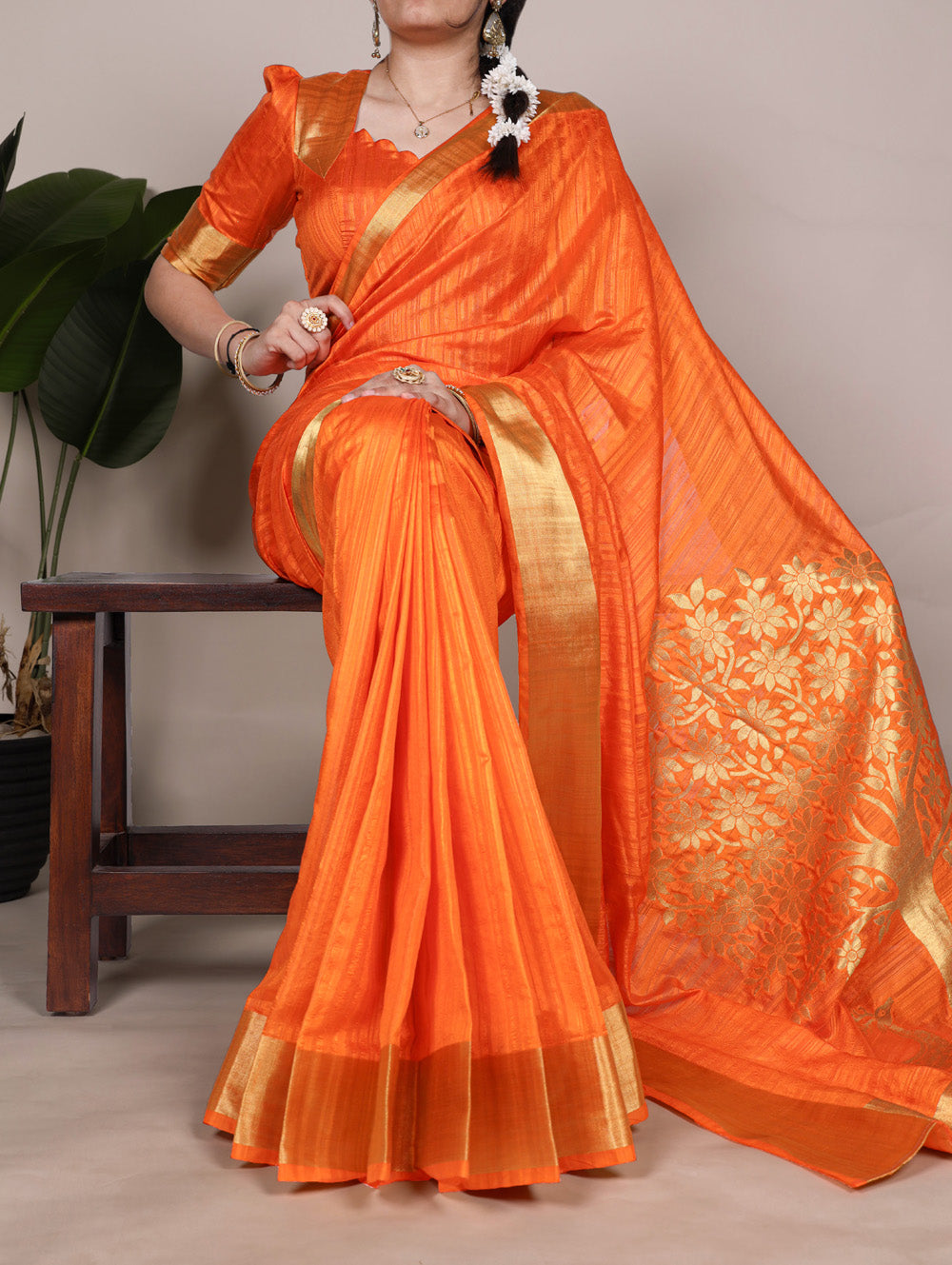 Orange raw silk saree with zari weaving