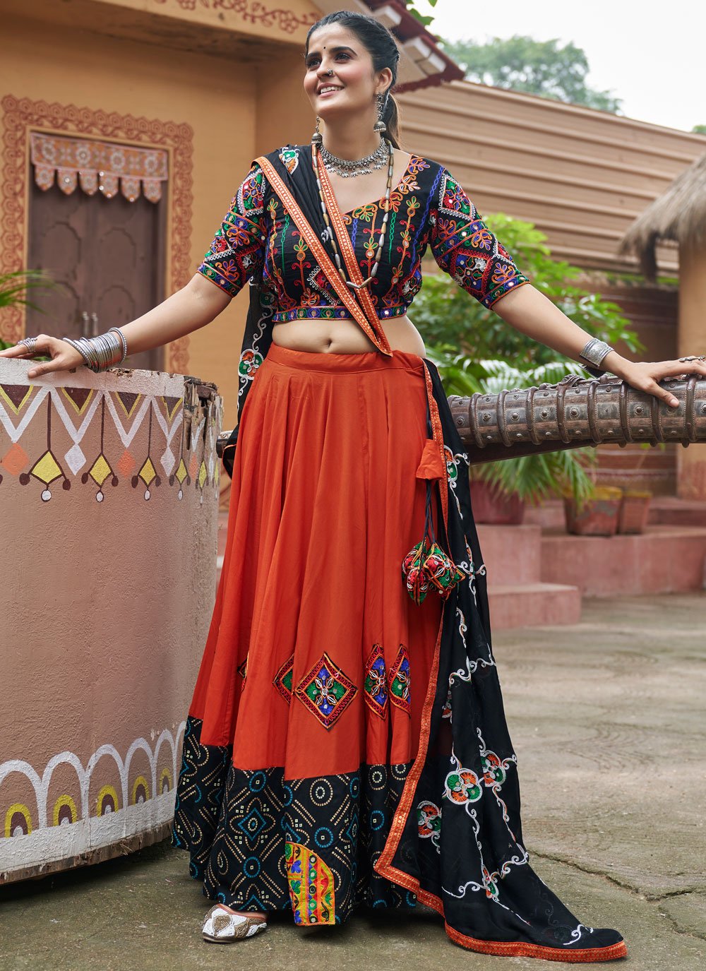 Orange Viscose Rayon Mirror Work Embroidered Lehenga Choli Online