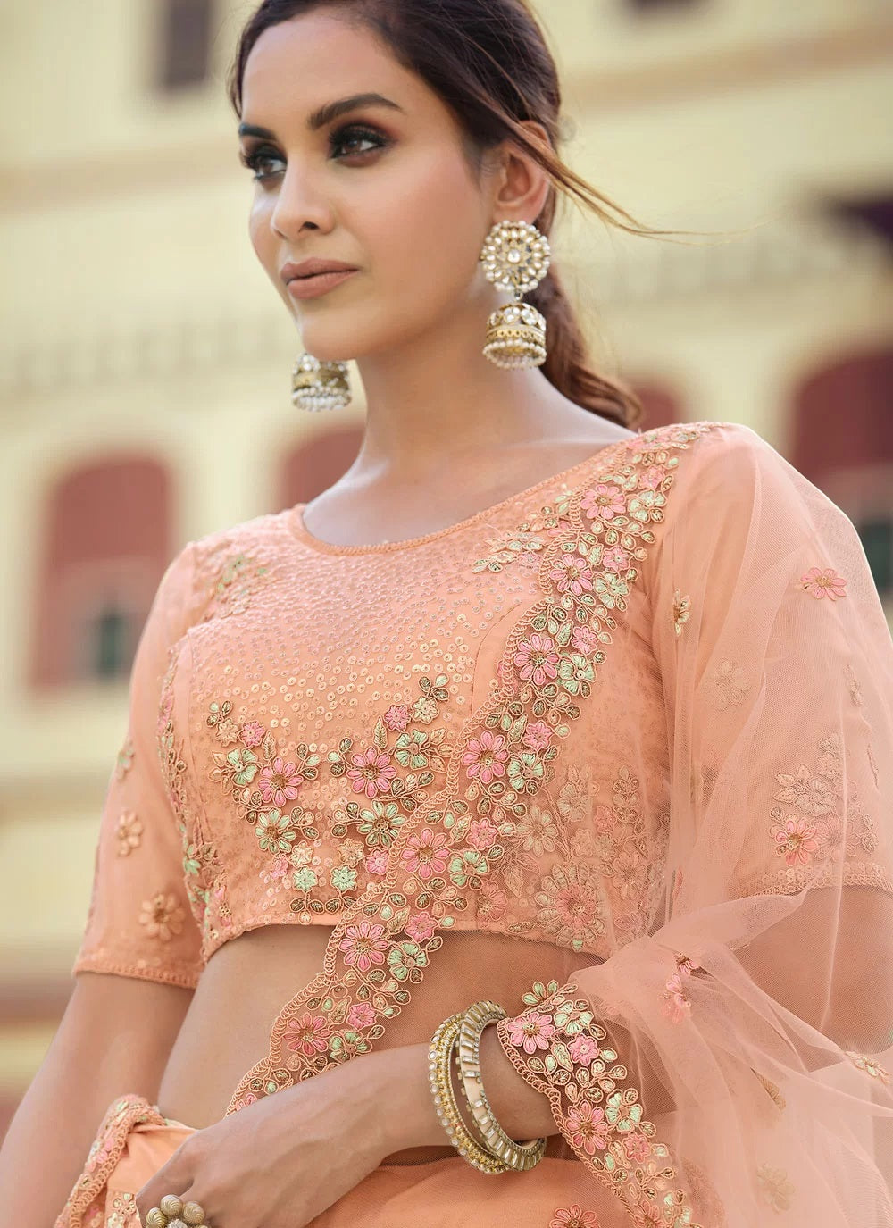 Party Wear Soft Net Sequins and thread work Lehenga in Peach