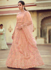 Party Wear Soft Net Sequins and thread work Lehenga in Peach