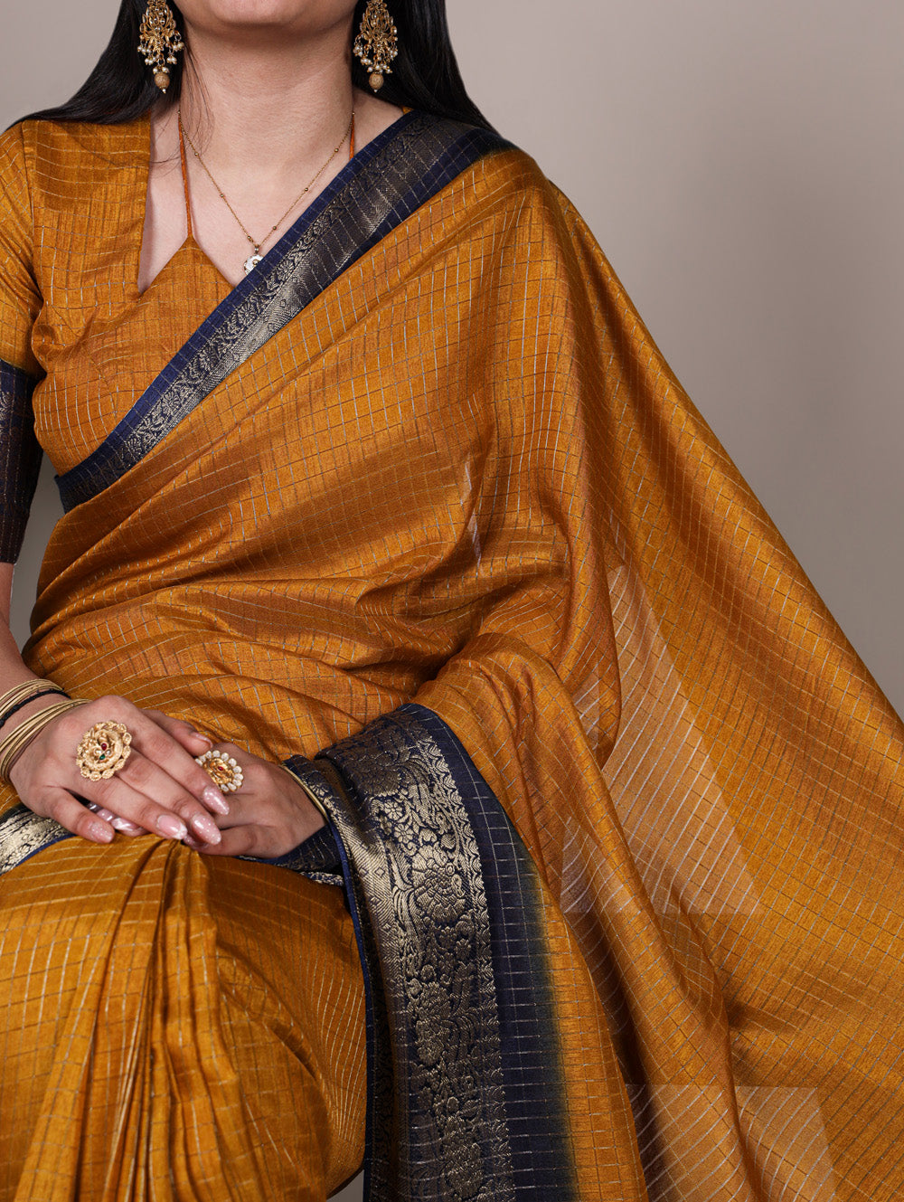 Traditional mustard color Dola Chex saree