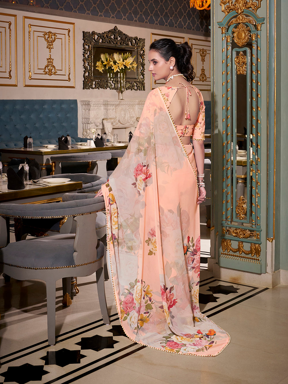 Peach saree with elegant lace border