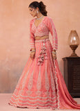 Designer peach embroidered lehenga set with sweetheart blouse and matching tissue dupatta.