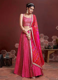 Pink and white embellished lehenga choli with dupatta and thread work