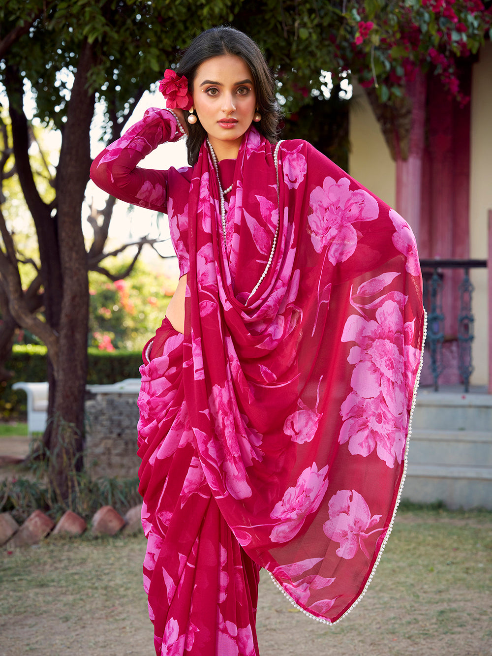 Pink chiffon floral printed saree with pearl lace border