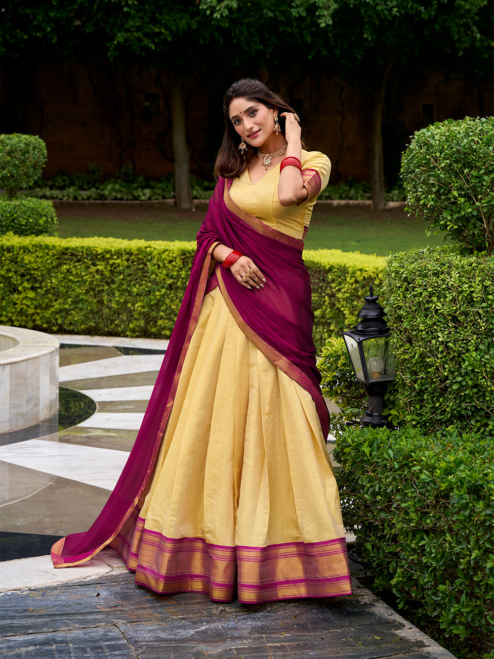 Pink Kanchipuram lehenga choli with zari border