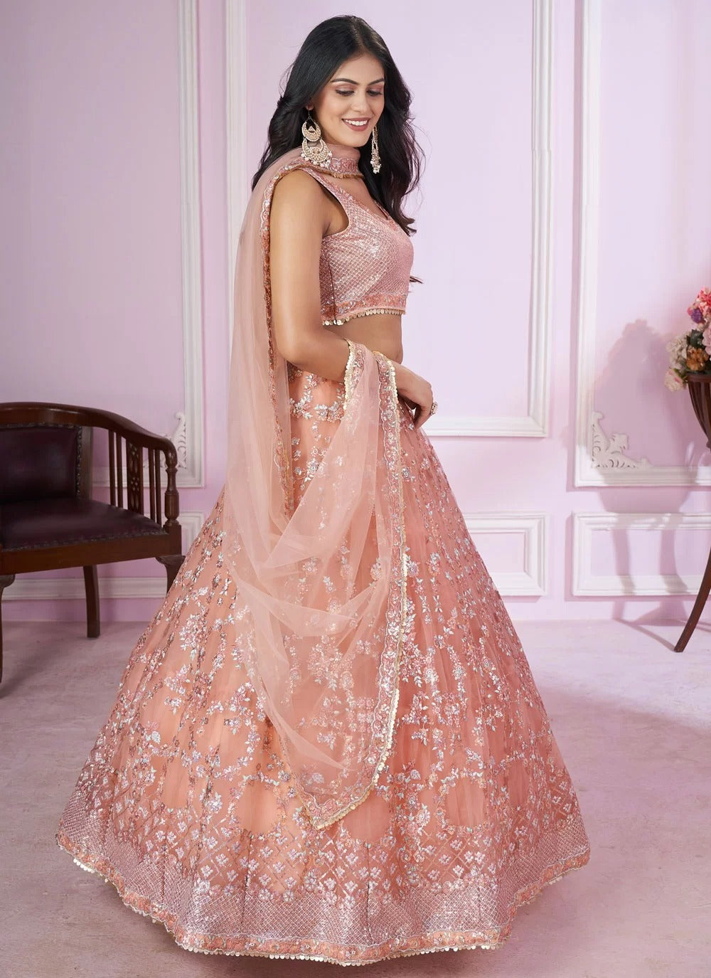 Pink soft net sangeet lehenga with sequins embroidery