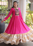 Pink Navratri gown with Kutchi Gamthi thread work and 12 metre flair