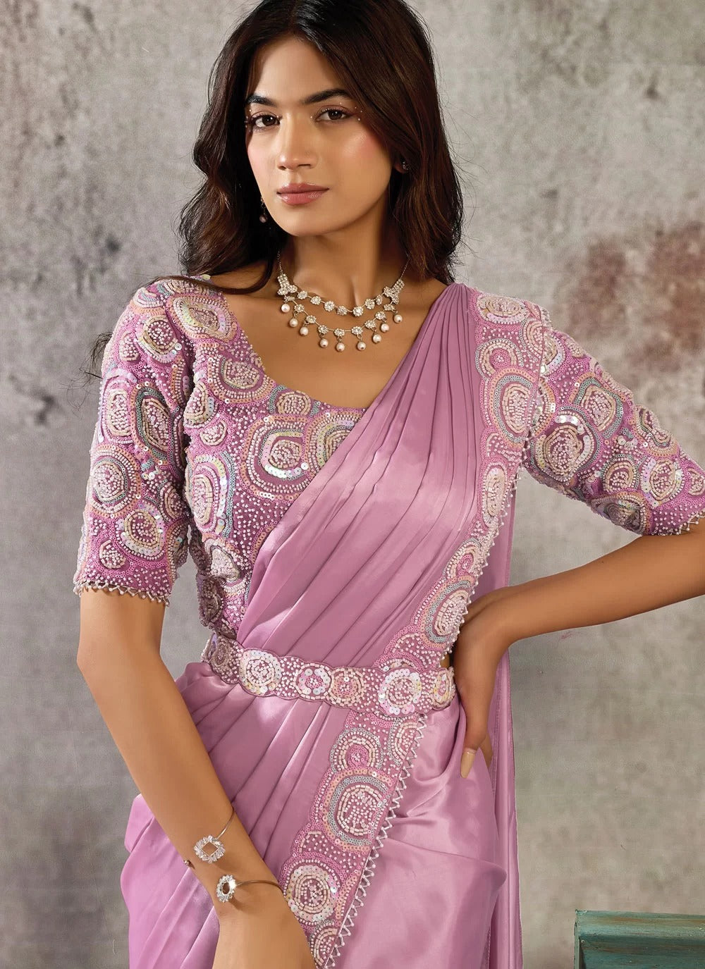 Party wear pink satin saree with sequins and beads