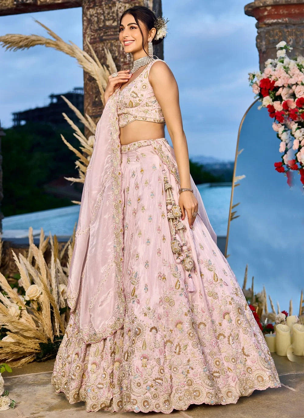 Pink reception lehenga with embroidered tissue dupatta