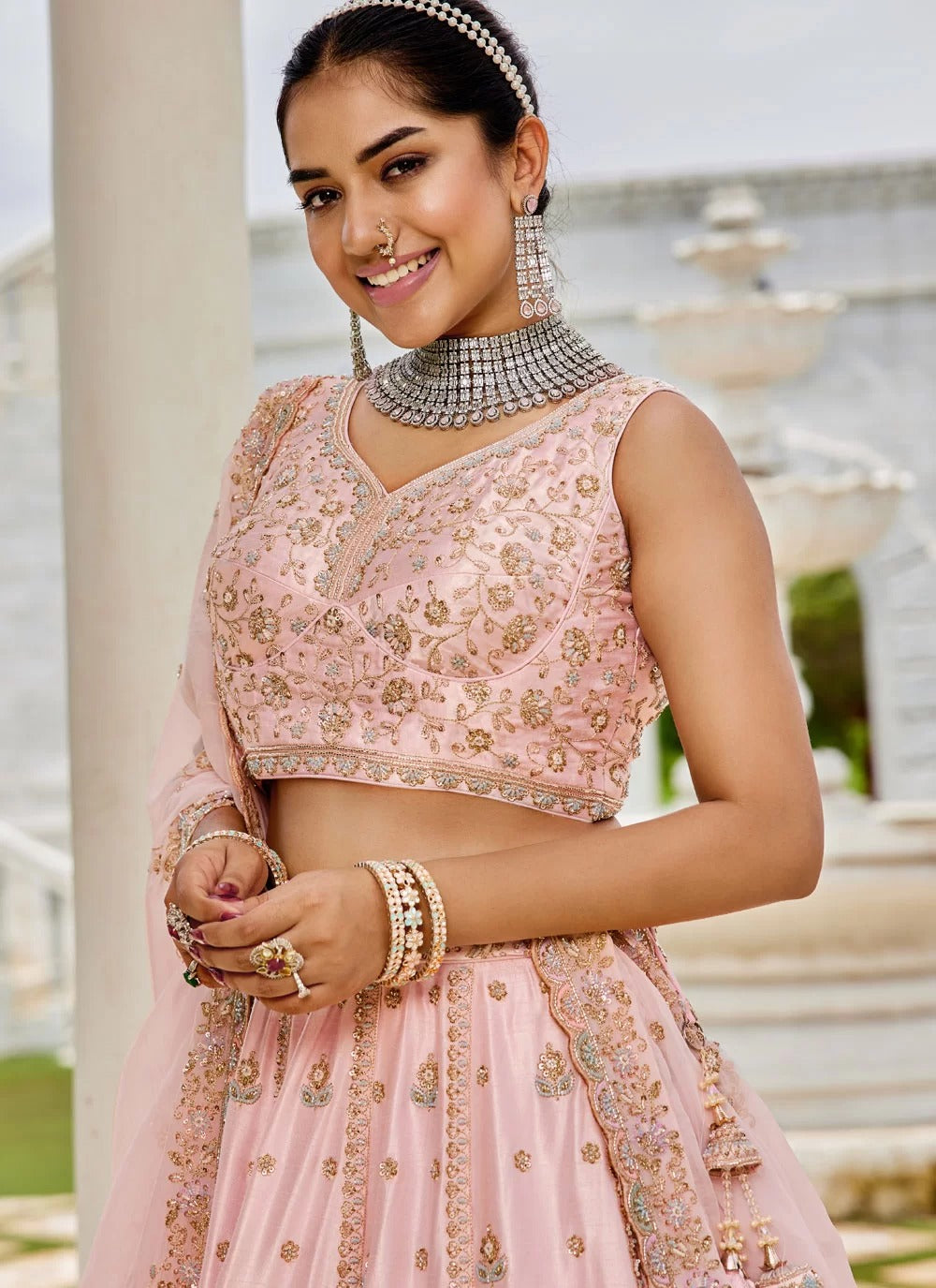 Pink silk lehenga choli with heavy sequin embroidery and organza dupatta